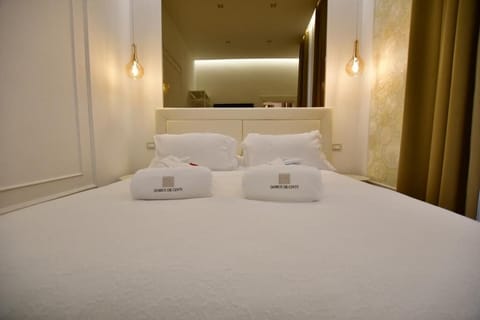 Deluxe Suite, 1 King Bed, Non Smoking, City View | In-room safe, blackout drapes, soundproofing