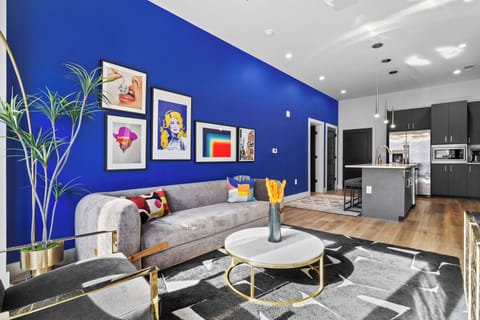 Bright designer living room with bold accents and open-concept layout