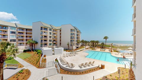 View of the Community Pool and Ocean from Private Balcony