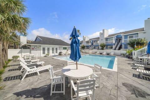 Lounge by the pool in a coastal paradise