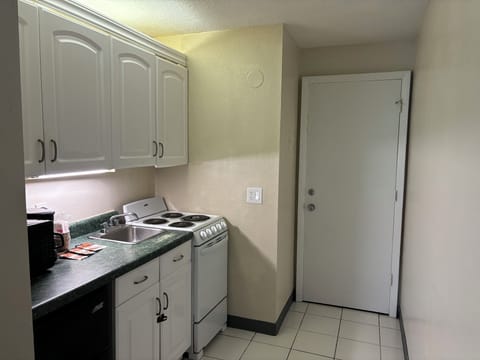 Deluxe Room, 2 Queen Beds, Kitchenette | Individually decorated, individually furnished, free WiFi, bed sheets