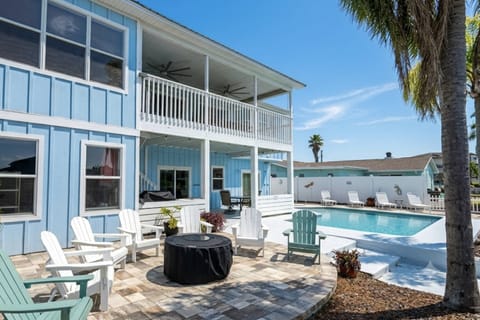Plenty of space for entertaining with pool, grill, firepit, dock, kayaks, and corn hole