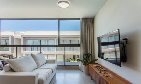 Basic Apartment | Living area | 40-inch TV with digital channels