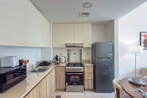 Deluxe Apartment, Balcony, Pool View | Private kitchen | Espresso maker, coffee/tea maker