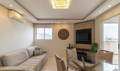 Basic Apartment | Living area | 40-inch TV with digital channels