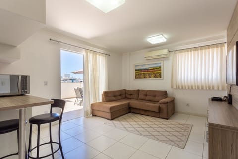 Basic Apartment | Living area | 40-inch TV with digital channels