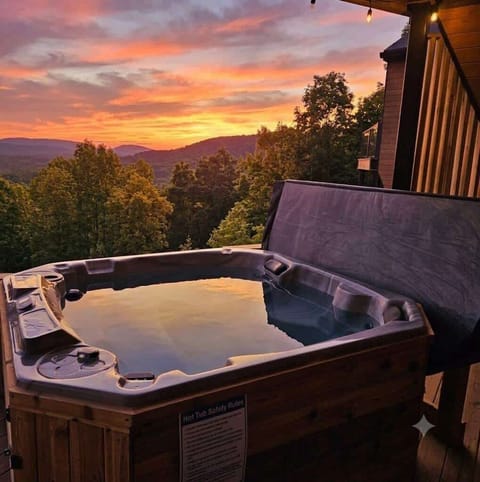 Enjoy an evening soak in the hot tub overlooking the mountains