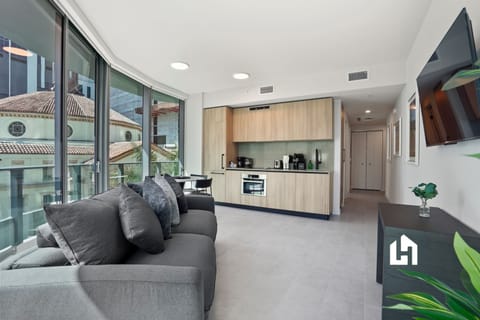 Apartment, Balcony, City View | Living area | Smart TV