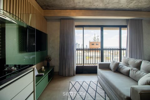 Basic Apartment | Living area | 40-inch TV with digital channels