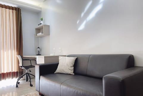 Basic Apartment | Living area | 40-inch TV with digital channels