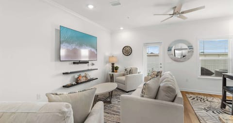 Curl up in the airy living room & stream your favorites on the smart TV​