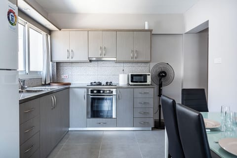 Apartment, Balcony | Private kitchen | Coffee/tea maker, electric kettle