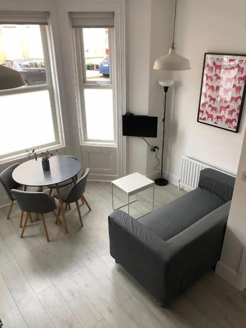Living area with sofa and dining table