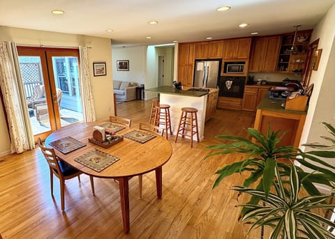 Open kitchen, dining, living, and deck area make it easy to spend time together.