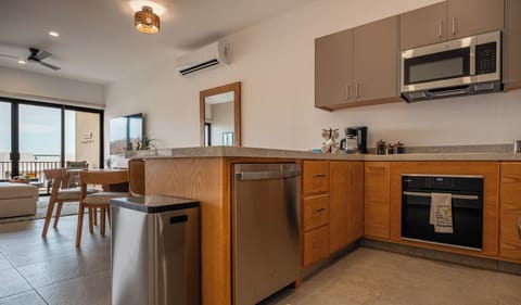 Deluxe Condo, 2 Bedrooms, Balcony, City View | Private kitchen | Full-size fridge, microwave, oven, stovetop