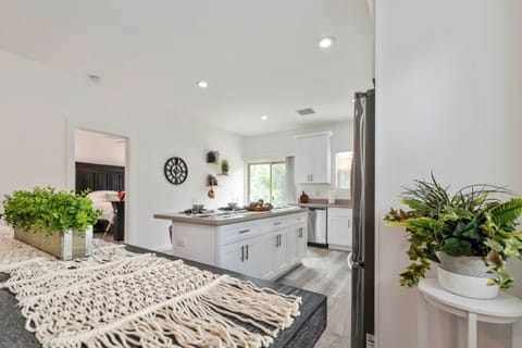Open kitchen with spacious island and plenty of room to gather. 