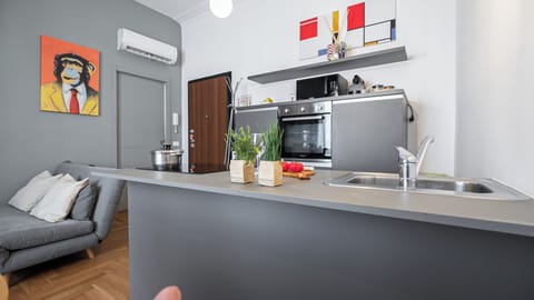 Apartment (1 Bedroom) | Private kitchen | Microwave, oven, stovetop, dishwasher