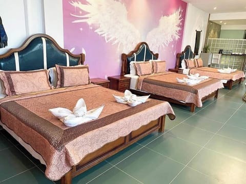 Family Triple Room, Beach View | In-room safe, desk, laptop workspace, WiFi (free)