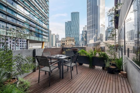 Take in Melbourne's skyline from the private terrace, where outdoor dining, surrounding greenery and elevated city views create an inviting setting to linger over coffee or an evening meal.