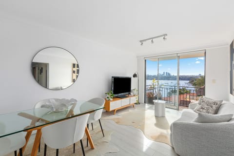 Experience harbourside living from a light-filled waterfront apartment, where ever-changing water views, village charm, and thoughtful comforts invite you to slow the pace.