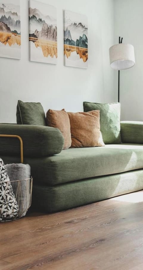 Comfortable living room seating and natural light create an inviting space to relax between Seattle-area adventures.