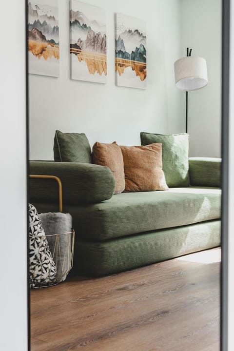 Comfortable living room seating and natural light create an inviting space to relax between Seattle-area adventures.