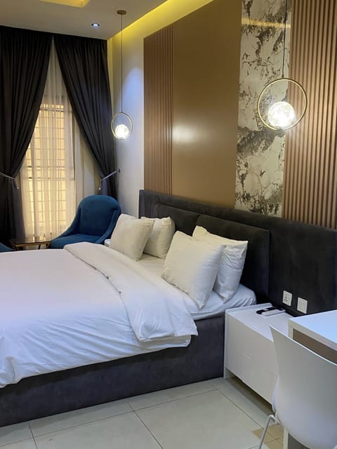 Economy Apartment, Balcony, City View | In-room safe, desk, laptop workspace, blackout drapes