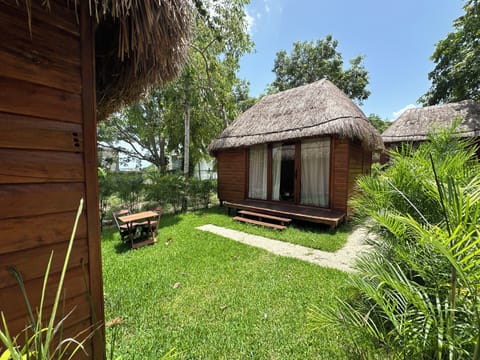 Deluxe Bungalow, Garden View | Outdoor dining | Breakfast, lunch, dinner and brunch served