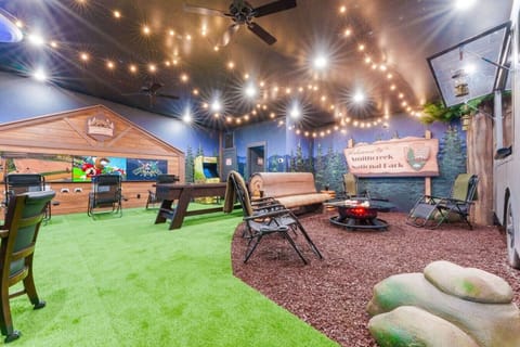 A one of a kind camping themed game room!