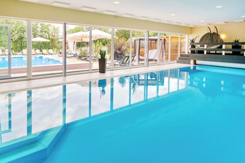 Indoor pool, outdoor pool, open 7:30 AM to 9:30 PM, pool umbrellas