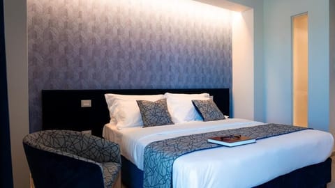 Frette Italian sheets, premium bedding, down comforters