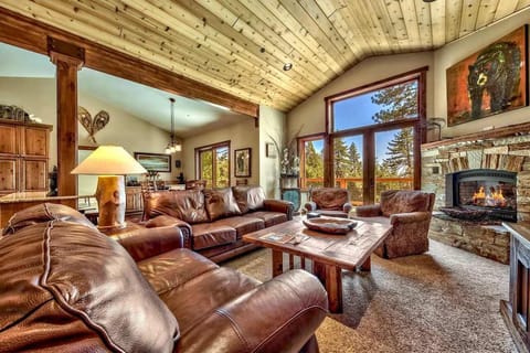  Living room: Gas fireplace, Smart TV, lake views