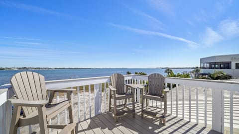 Relax on the waterfront deck with sweeping views and beachside seating