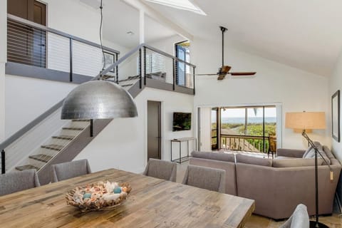 Dining and living areas share one open space for gathering.