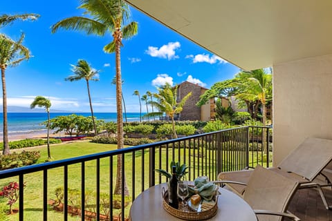 Relax on your private lanai overlooking lush tropical grounds and the ocean.