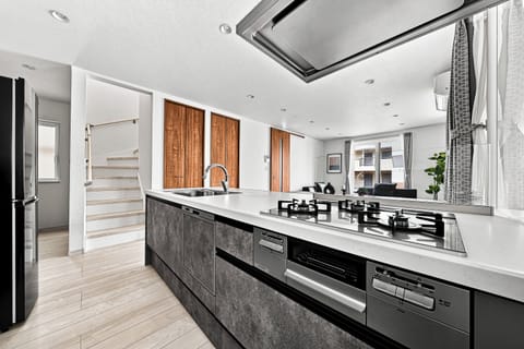 Apartment | Private kitchen | Fridge, microwave, stovetop, dishwasher