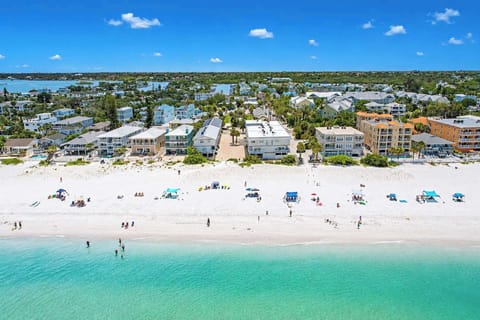 Wide, white-sand beach and crystal-clear Gulf waters just beyond your neighborhood — plenty of room for beach chairs, umbrellas, and lazy afternoons in the sun.