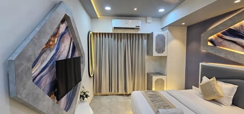 Deluxe Double Room, City View | In-room safe, desk, laptop workspace, iron/ironing board