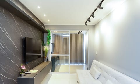 Basic Apartment | Living area | 40-inch TV with digital channels