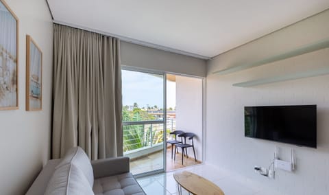 Basic Apartment | Living area | 40-inch TV with digital channels