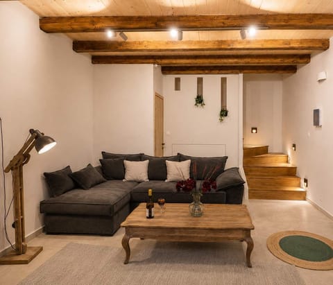 Comfortable lounge with exposed wooden ceilings