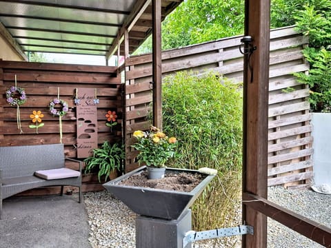Furniture, Garden, Flowerpot, Outdoor Furniture, Backyard, Wood Stain, Hardwood, Yard, Chair