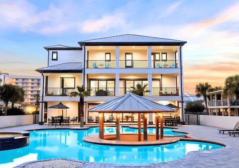 Welcome to Atlantis - One roof, room for 24 — 9 bedrooms that keep extended families and wedding guests together.