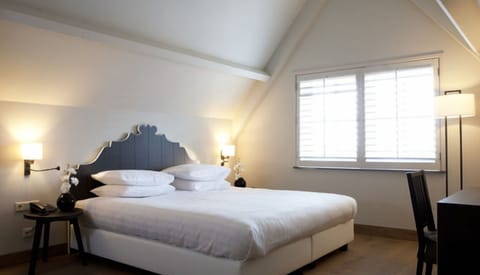 Stretch out in a serene bedroom designed for deep rest.