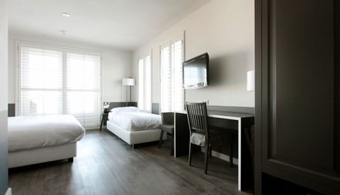 Arrive to a bright, spacious bedroom designed for total relaxation.