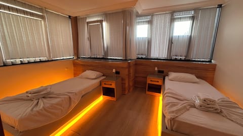 Family Quadruple Room, City View | In-room safe, desk, WiFi (free)