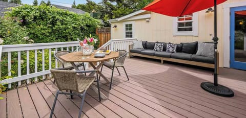 Relax on the private deck surrounded by lush gardens.