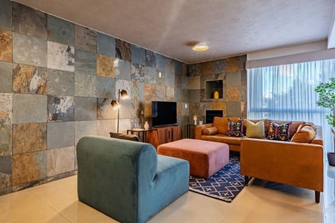 Kick back in this stylish living room, perfect for relaxed nights in.