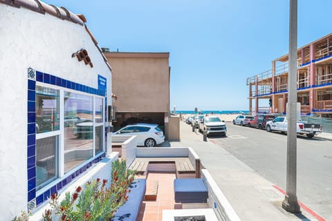 Step outside and enjoy a glimpse of the ocean just down the street
                