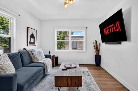 Living Room: Cozy up in this inviting living room, featuring comfortable seating, warm natural light, and a relaxing atmosphere that’s perfect for unwinding after a day of exploring.